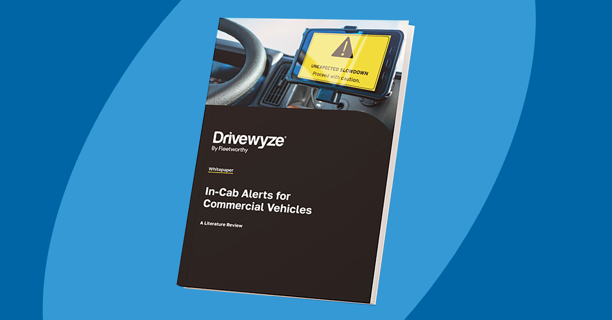 A booklet titled In-Cab Alerts for Commercial Vehicles by Drivewyze is displayed, featuring a photo of a truck dashboard with a tablet showing an unexpected slowdown alert—highlighting the benefits of Smart Roadways technology.